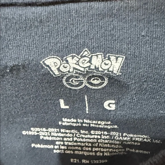 Pokemon Black Tee with Vibrant Circular Design - Picture 3 of 6